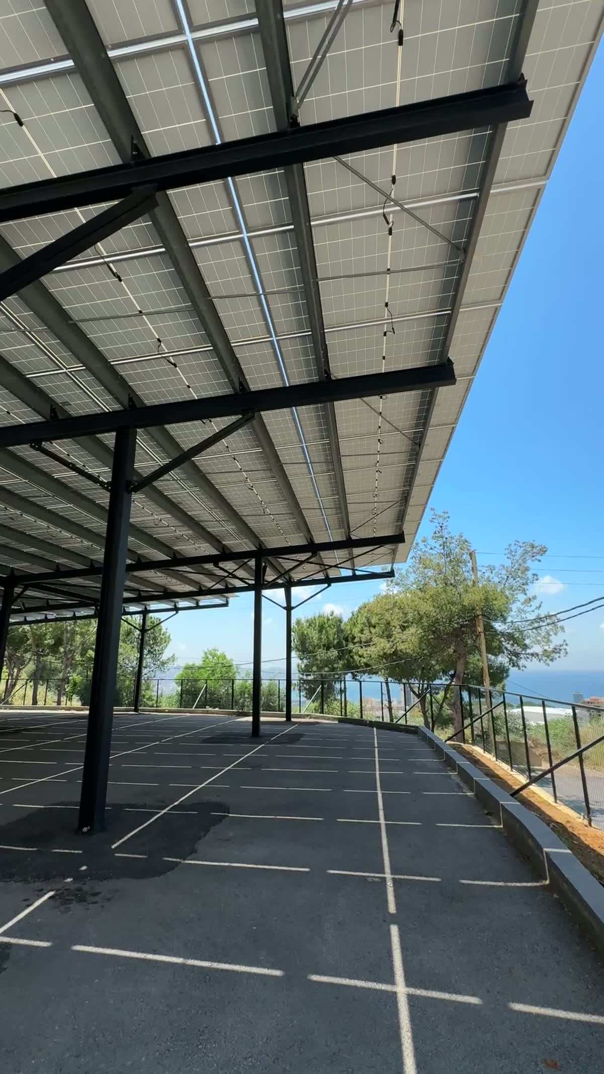 McKinsey Electronics solar carport overlooking the Mediterranean